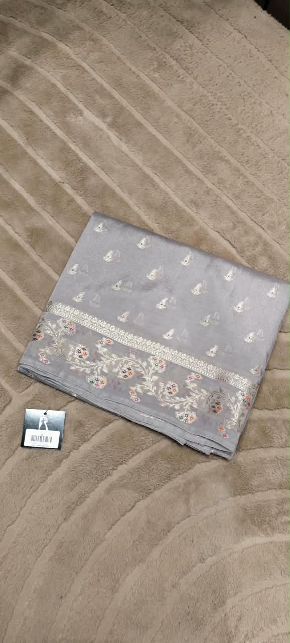 Handcrafted Moonga Muslin Banarasi Saree Featuring Vibrant Meenakari Floral Bootis and Rich Zari Weave- 16542