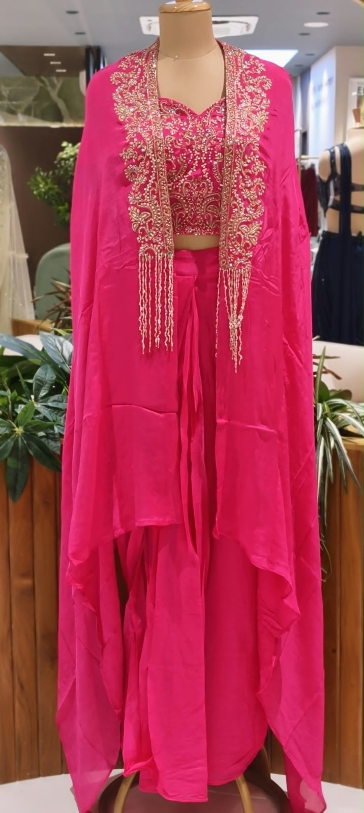 Hand Embellished Bustier With Chinon Drape Skirt Set & Matching Flowy Cape Featuring Intricate Tassels Detailing- 16633