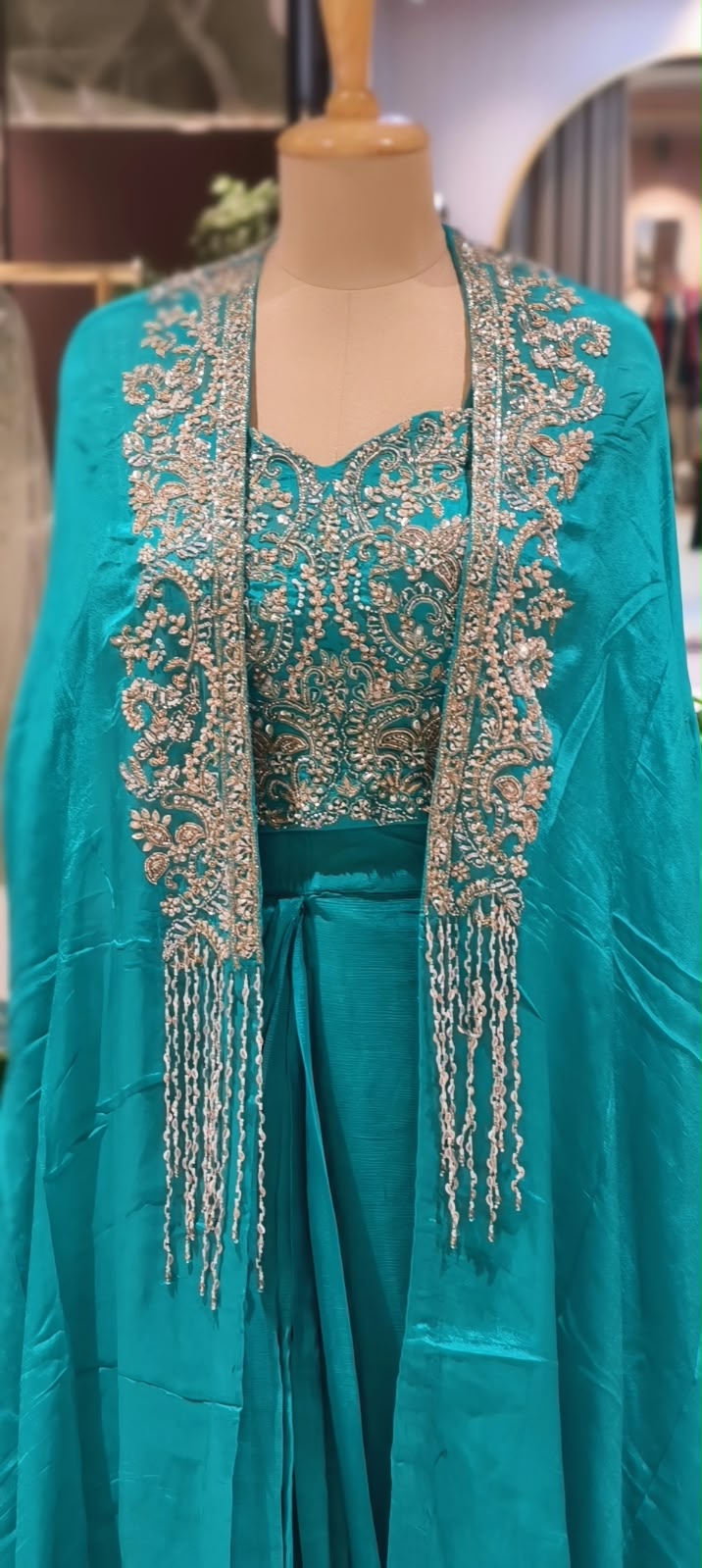 Hand Embellished Bustier With Chinon Drape Skirt Set & Matching Flowy Cape Featuring Intricate Tassels Detailing- 16633