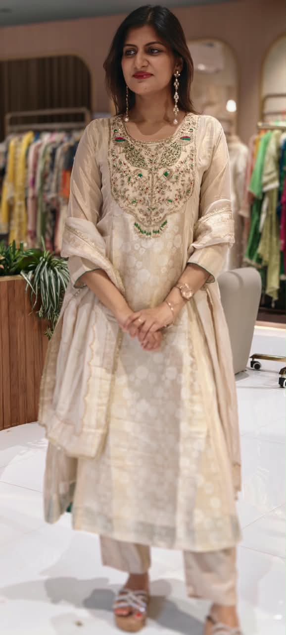Traditional Brocade and Tissue Silk Anarkali Suit featuring Peacock Zardozi Work and Emerald Bead Accents- 16585