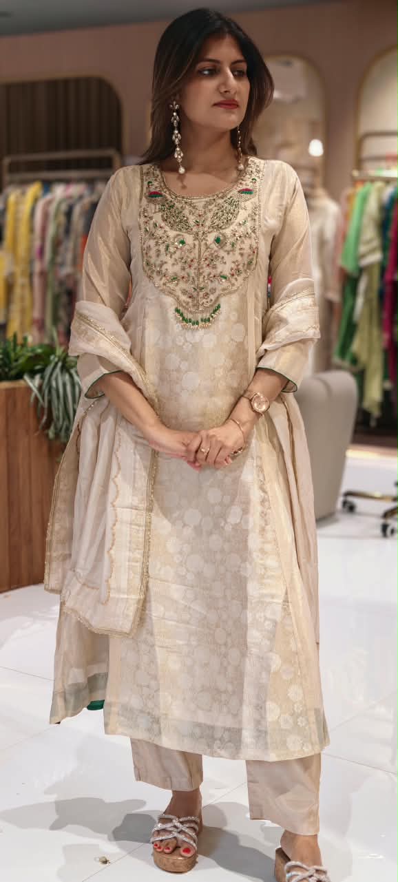 Traditional Brocade and Tissue Silk Anarkali Suit featuring Peacock Zardozi Work and Emerald Bead Accents- 16585