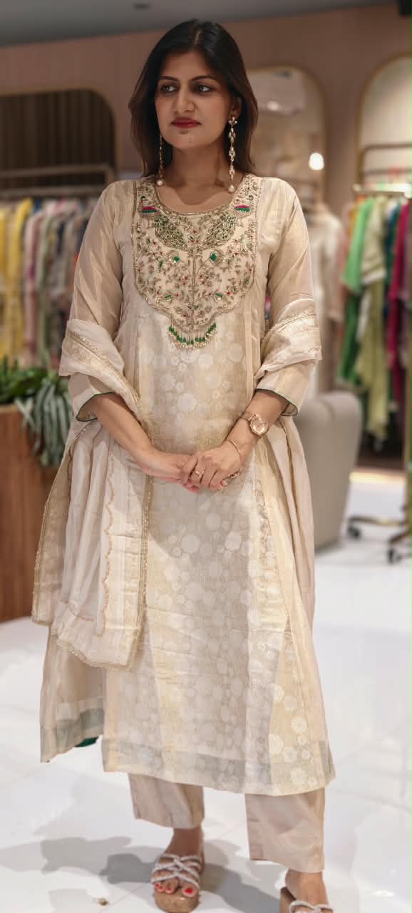 Traditional Brocade and Tissue Silk Anarkali Suit featuring Peacock Zardozi Work and Emerald Bead Accents- 16585