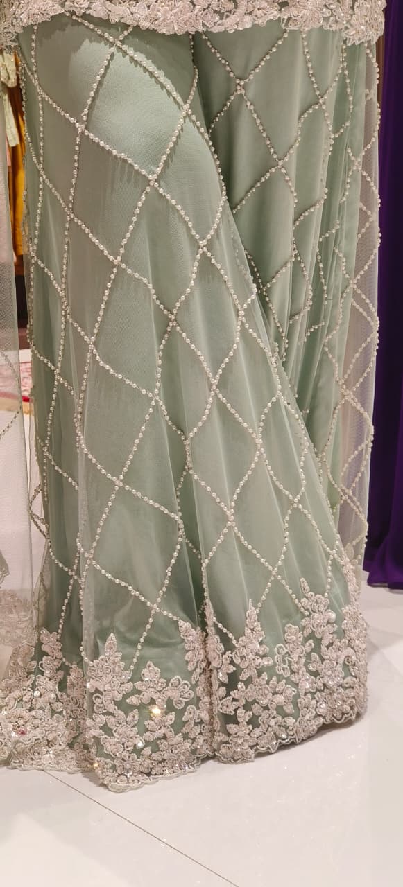 Premium Pastel Green Heavy Embellished Set Ensemble with Detailed Sequin–Pearl Work Kurta and Matching Embroidered Dupatta And Flare Bottom-12610 (DISPATCHING AFTER 30 DAYS ON ORDERS)