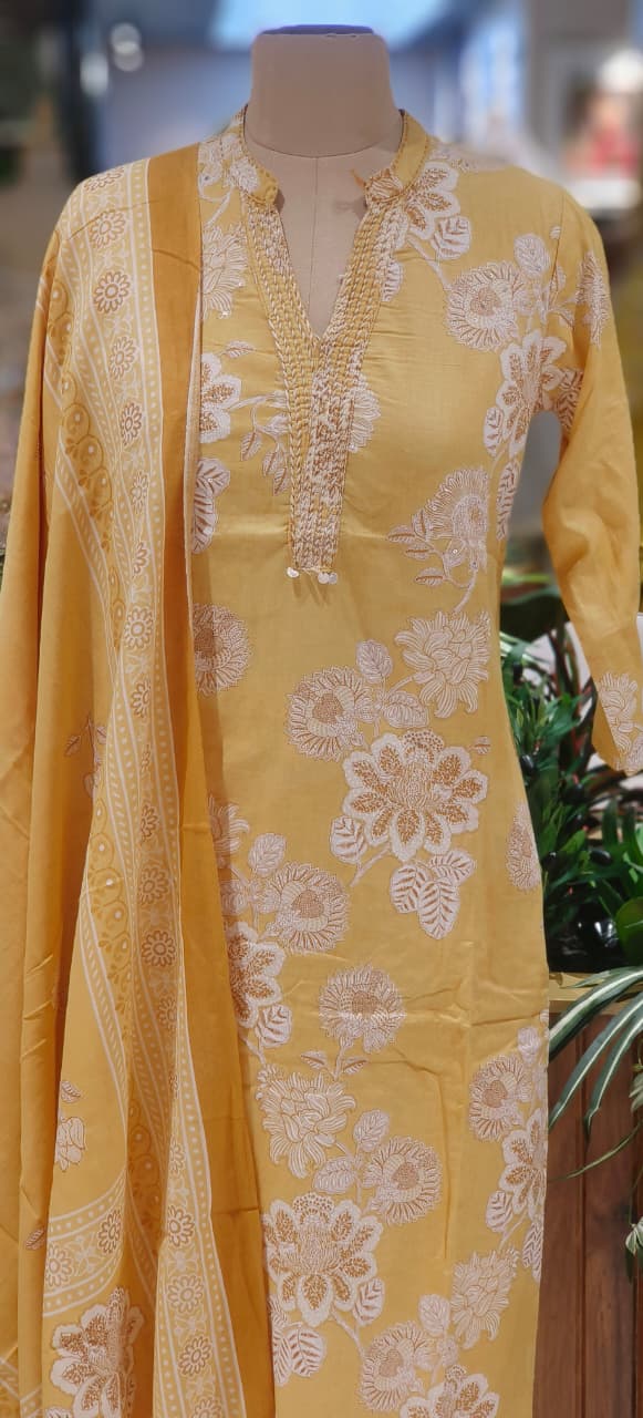 Printed Mustard Cotton Suit Set with Fine Neck Embellishment & Coordinated Bottom