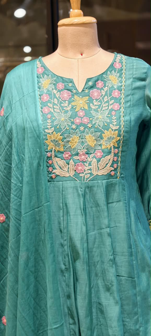Graceful Floral Threadwork Over Yoke & Sleeve Surat Mul-Chanderi A-Line Full Suit Set with Dupatta- 16897