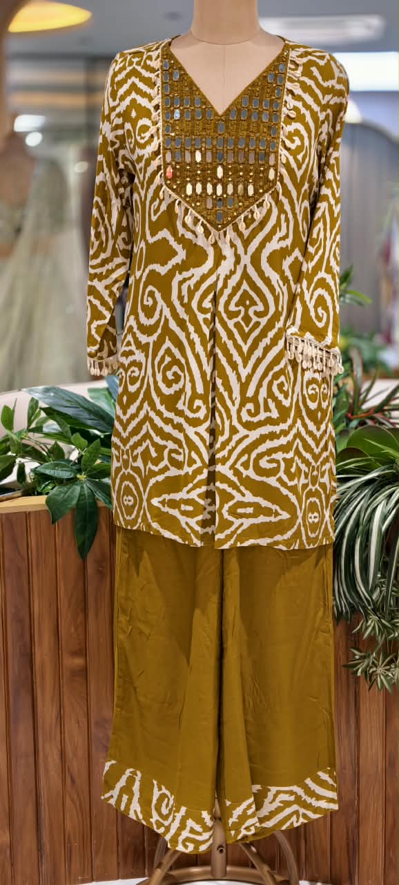 Slub Cotton Printed Kurta Pant Set with Intricate Real Mirror Work Embellished Neckline and Statement Ethnic Motif Print