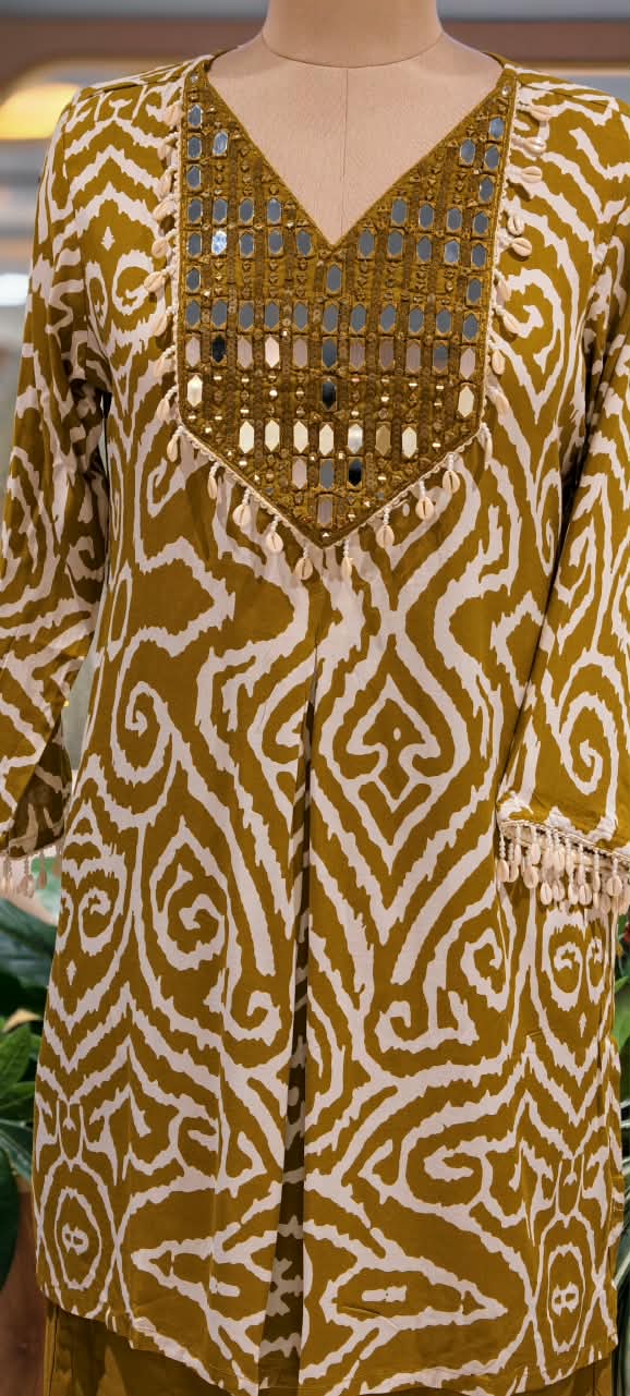 Slub Cotton Printed Kurta Pant Set with Intricate Real Mirror Work Embellished Neckline and Statement Ethnic Motif Print