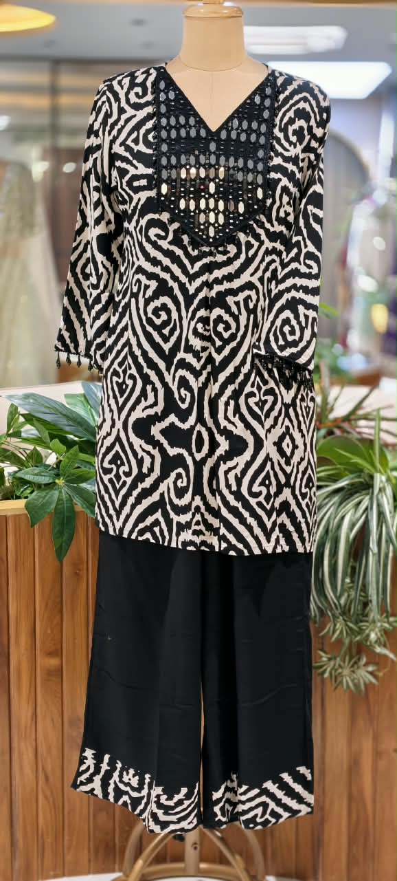 Slub Cotton Printed Kurta Pant Set with Intricate Real Mirror Work Embellished Neckline and Statement Ethnic Motif Print