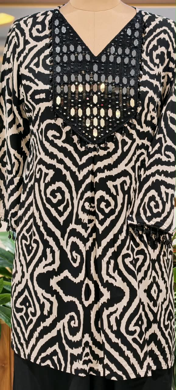 Slub Cotton Printed Kurta Pant Set with Intricate Real Mirror Work Embellished Neckline and Statement Ethnic Motif Print