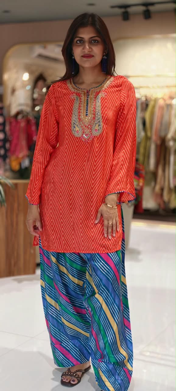 Orange Chevron Diagonal Printed Crepe Short Kurti With Intricate Heavy Embroidered Scoop Neckline and Multicolor Leheriya Farshi Salwar- 16993