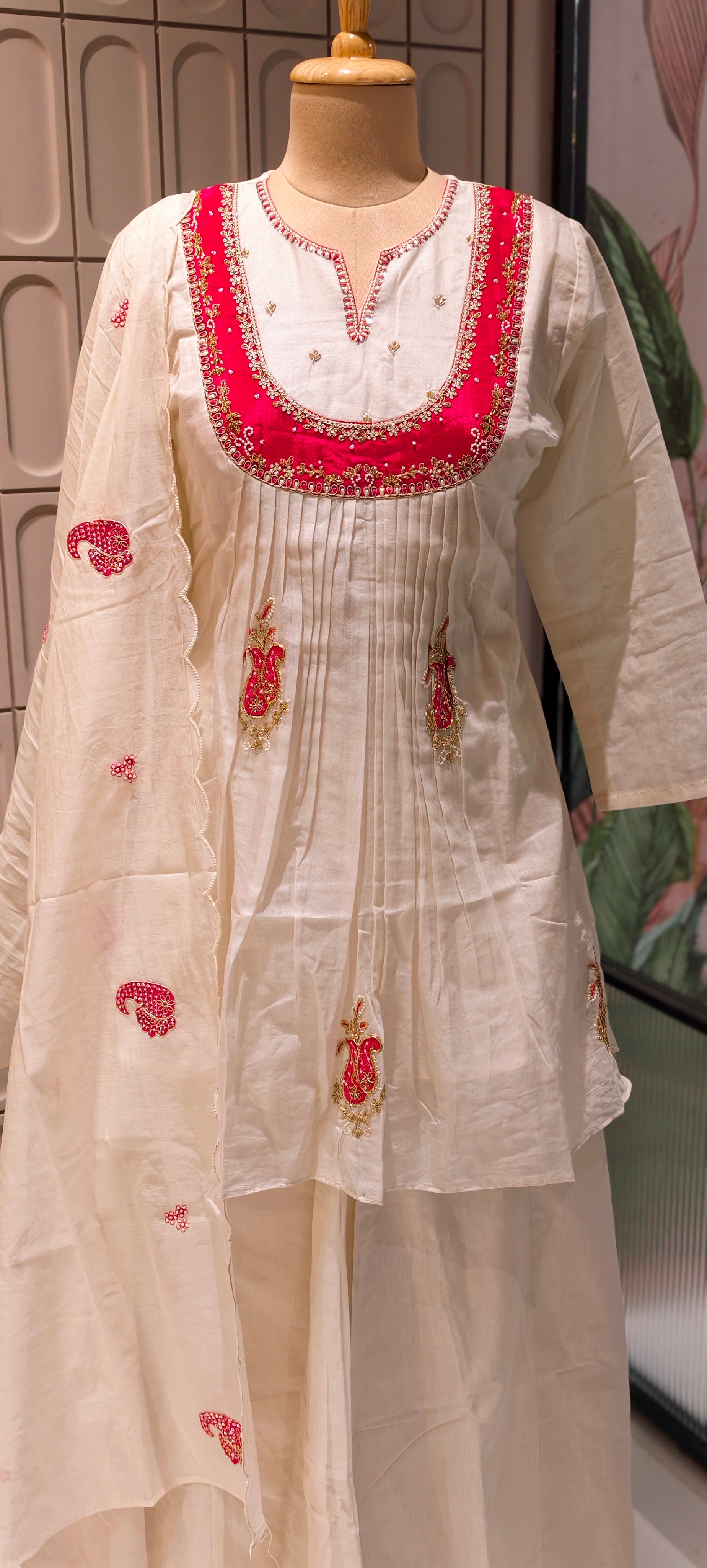 Elegant Ivory MulChanderi Peplum Style Kurta Suit Set with Hand-Embroidered Red Yoke and Festive Motifs-13858